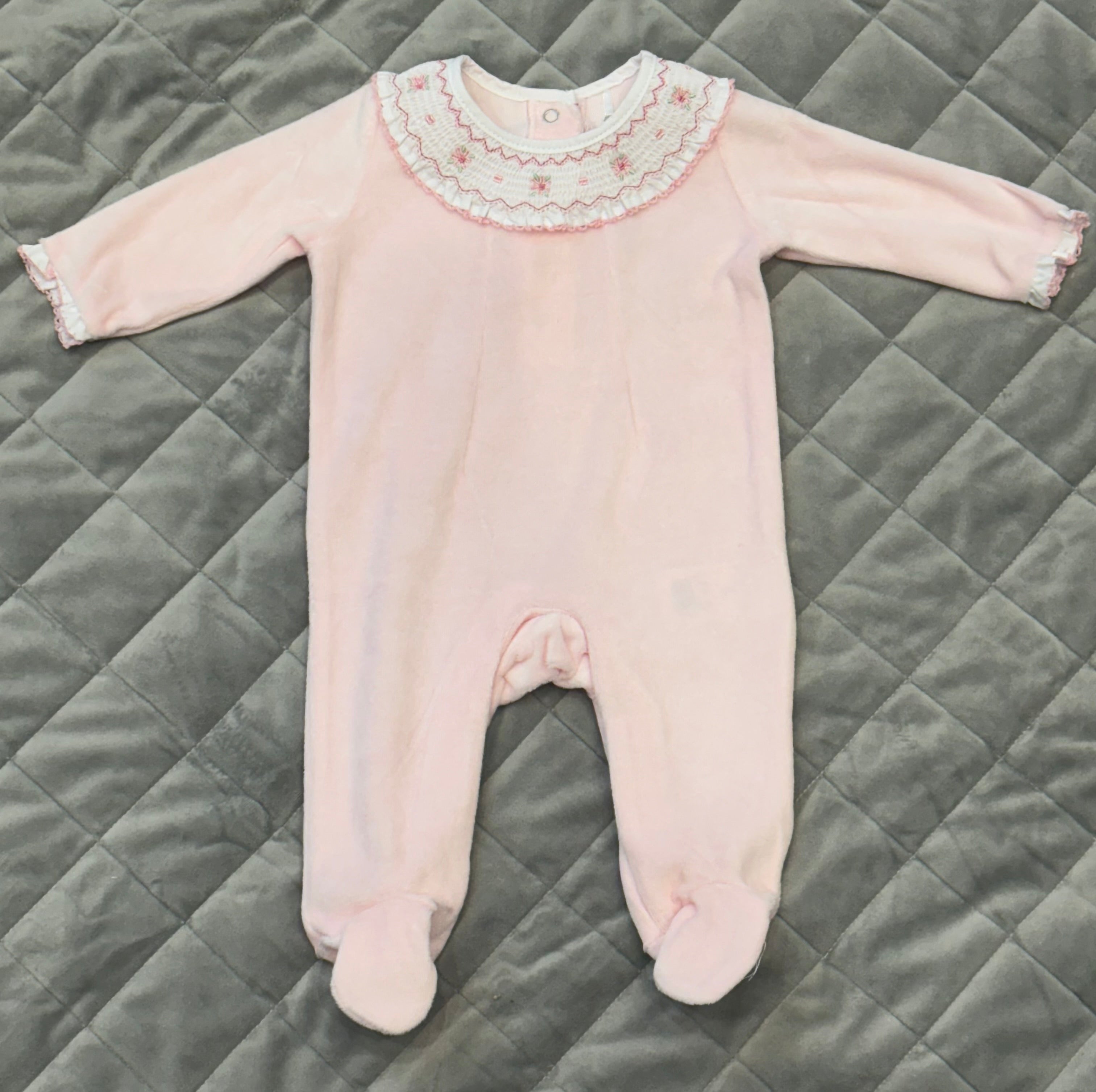 Pink velour baby grow