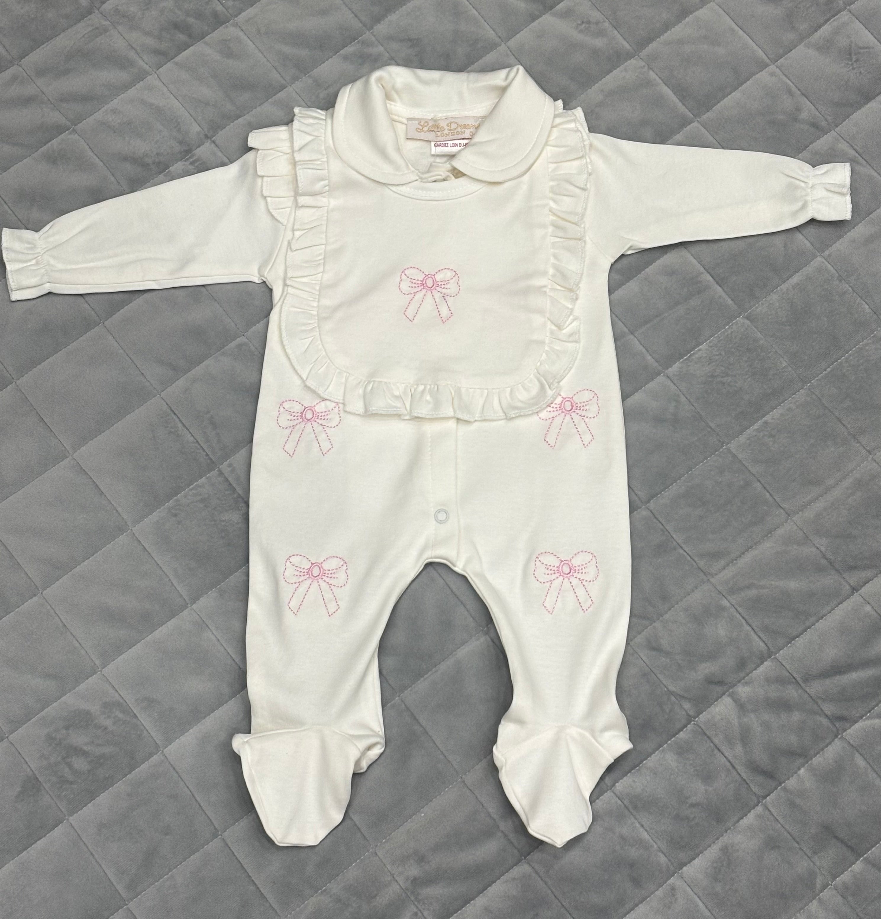 White and pink bow baby grow